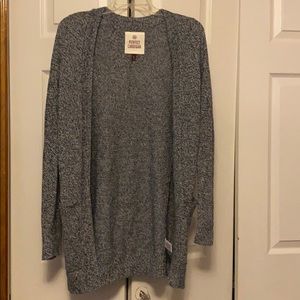 Blue and white knitted cardigan